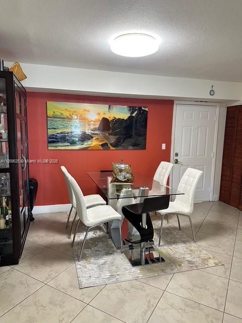 17901 Northwest 68th Avenue, Unit R101 Hialeah, FL 33015 - Photo 4 of 20 a outdoor space with furniture