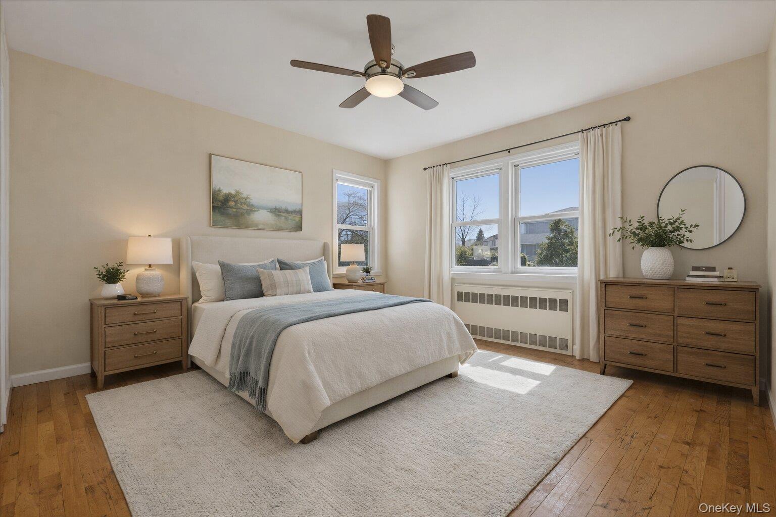 1719 William Street Merrick, NY 11566 - Photo 20 of 38 a bedroom with a bed and a window