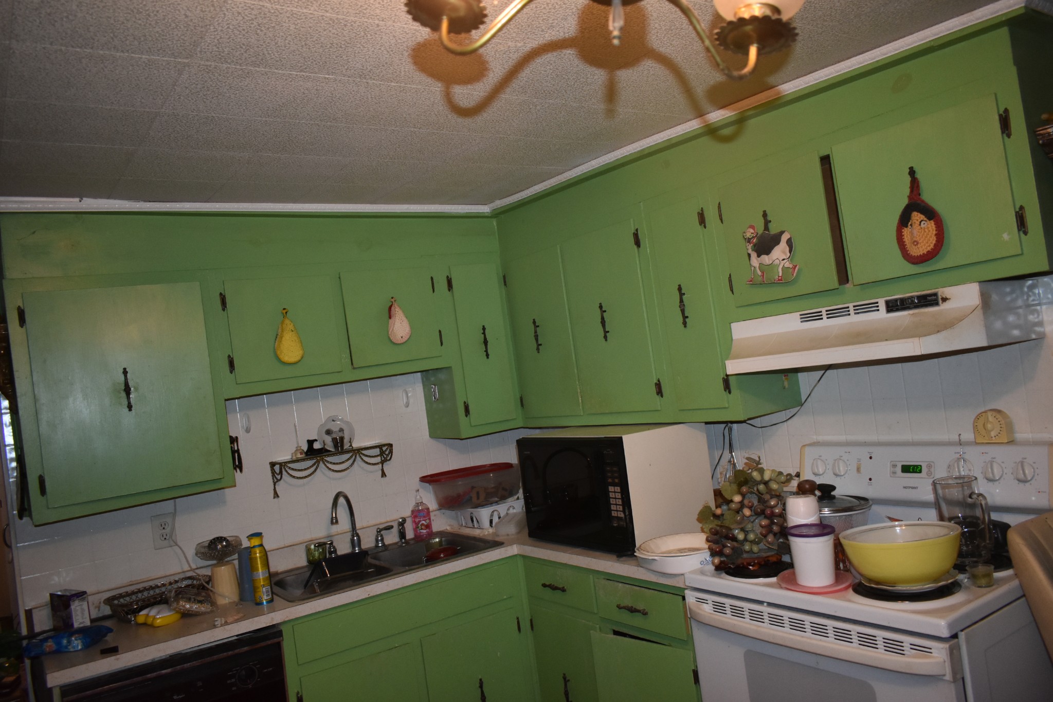 209 Hillcrest Drive Madison, TN 37115 - Photo 26 of 27 a kitchen with a sink and a stove top oven