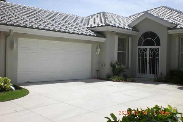 140 Hampton Circle Jupiter, FL 33458 - Photo 1 of 24 FRONT EXTERIOR