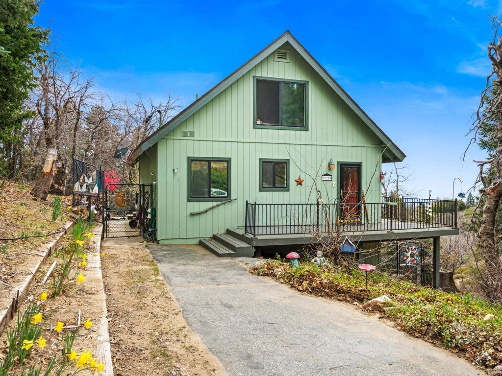 22209 Crestline Road Palomar Mountain, CA 92060 - Photo 12 of 51 a front view of a house with a yard