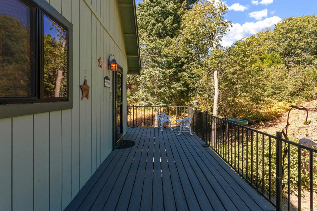 22209 Crestline Road Palomar Mountain, CA 92060 - Photo 14 of 51 a view of balcony with wooden floor and fence