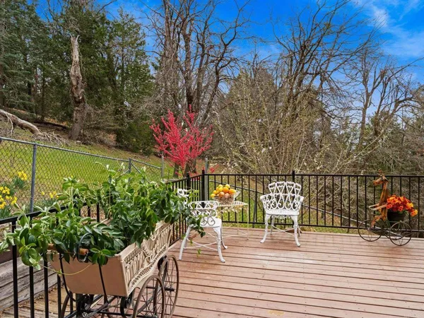 a view of a terrace with furniture