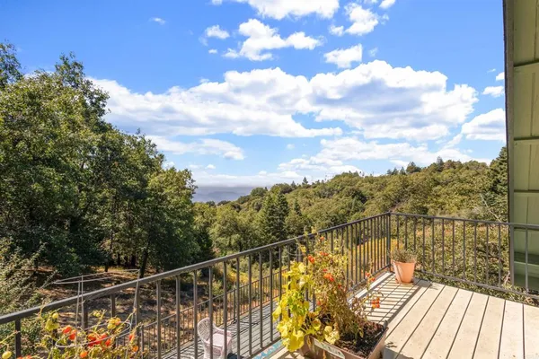 a view of a house with roof deck