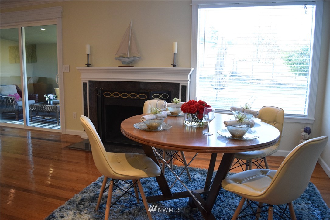 703 Bing Road, Unit A Lynnwood, WA 98036 - Photo 7 of 13 a view of a dining room with furniture and window