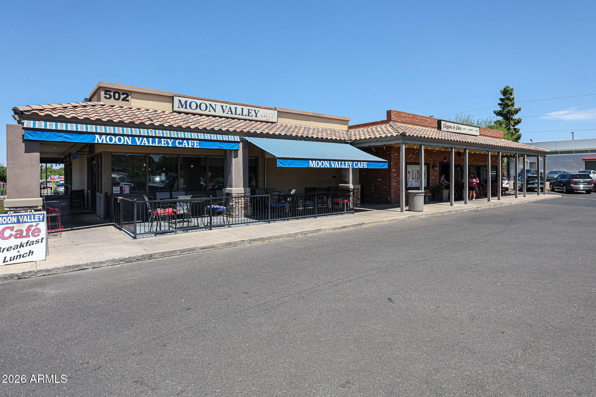 10410 North Cave Creek Road, Unit 1011 Phoenix, AZ 85020 - Photo 45 of 54 a view of a building with a patio