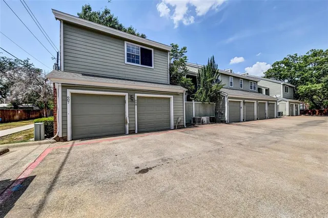 a house with palm tree in front of it
