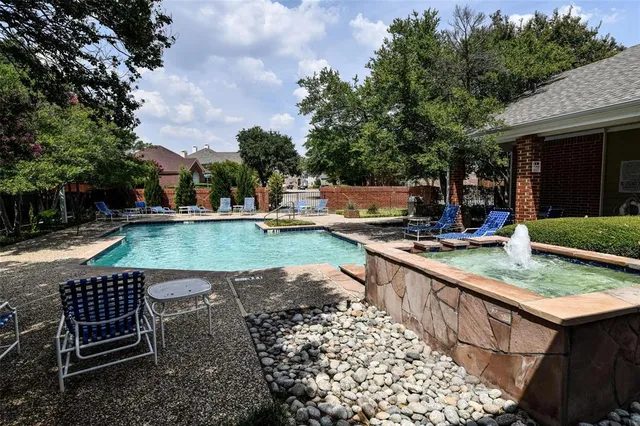 a view of backyard with seating space