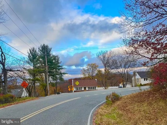 a view of a street with houses