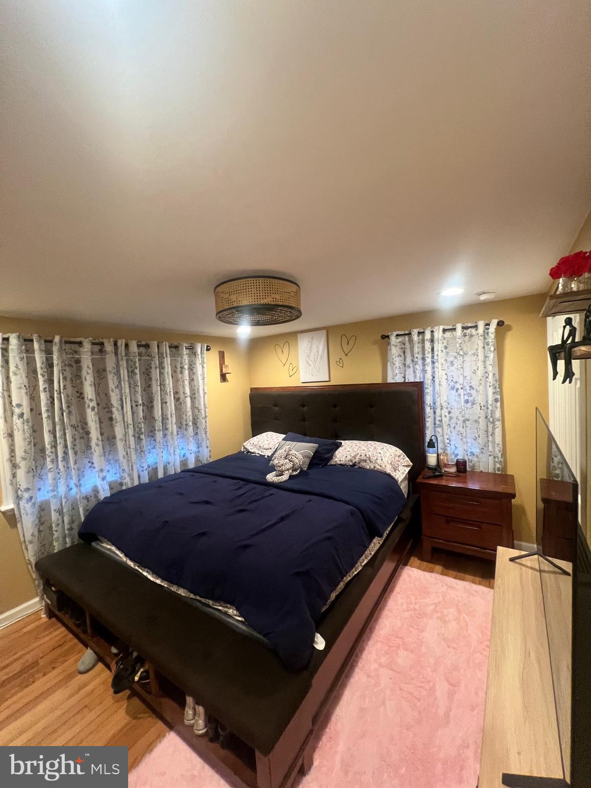 1100 Levengood Road Pottstown, PA 19464 - Photo 3 of 16 a bed sitting in a bedroom next to a window