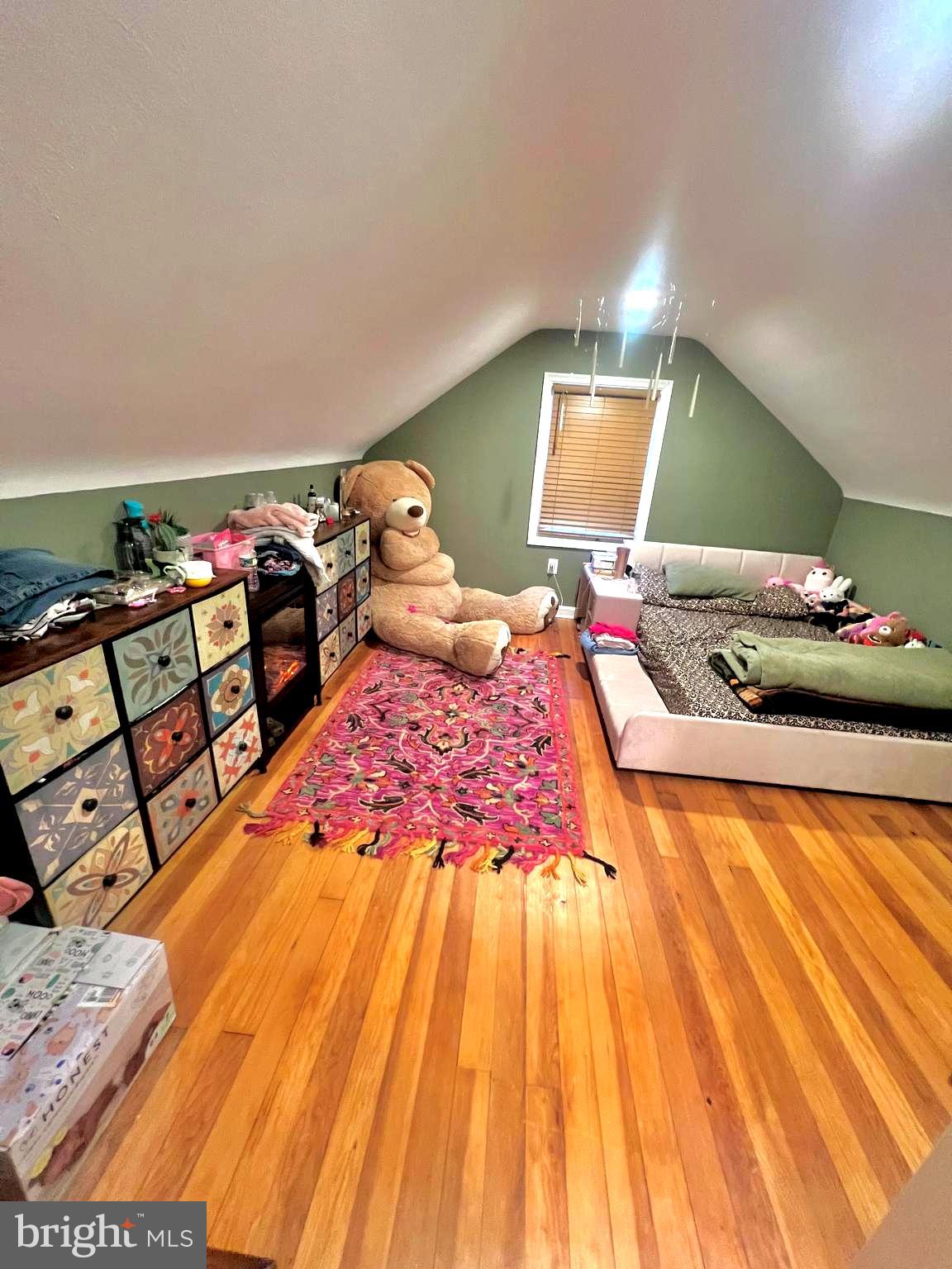 1100 Levengood Road Pottstown, PA 19464 - Photo 6 of 16 a bedroom with a bed and wooden floor