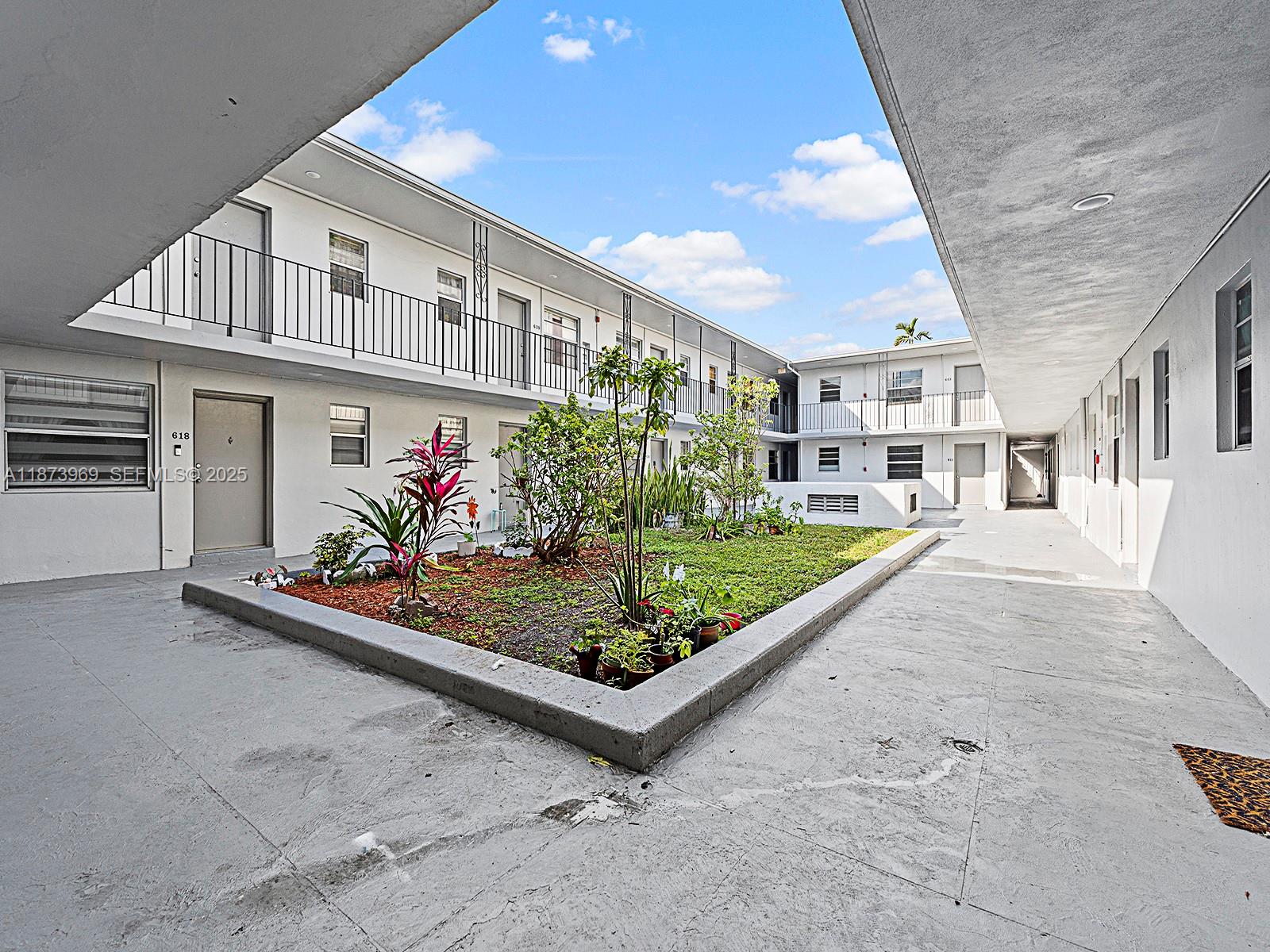 10305 Southwest 40th Street Miami, FL 33165 - Photo 4 of 5 a front view of a house with garden