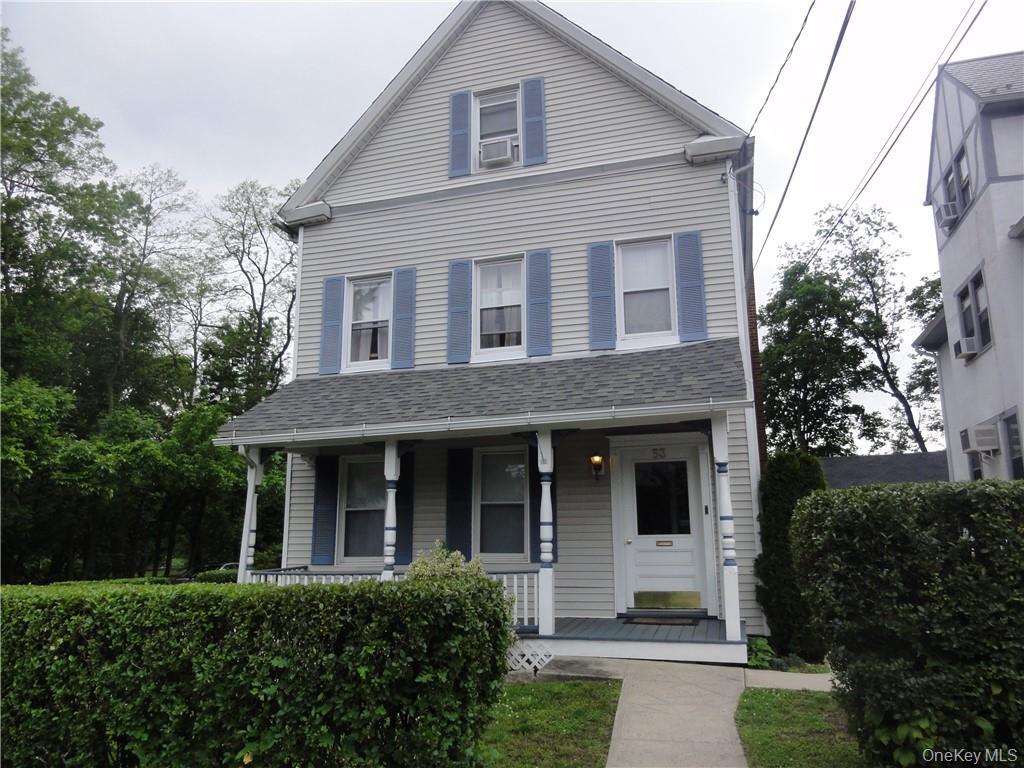 53 Dewitt Avenue, Unit 2 Bronxville, NY 10708 - Photo 1 of 19 a front view of a house with garden and trees