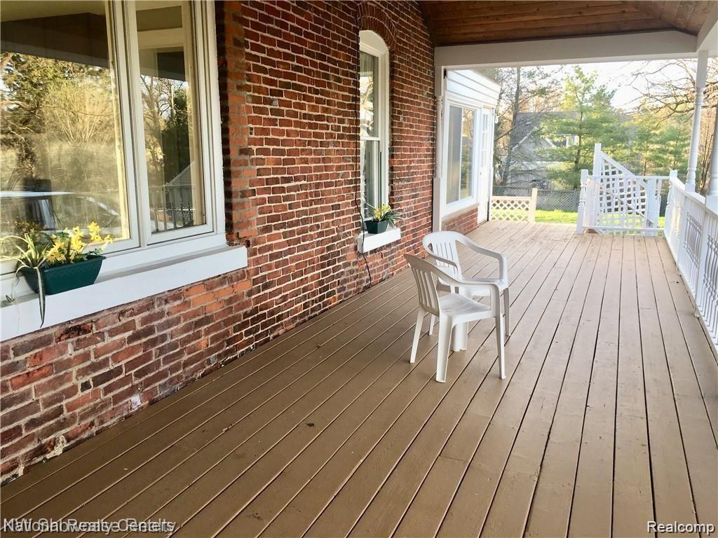3920 East Commerce Road Commerce Township, MI 48382 - Photo 5 of 36 Covered porch