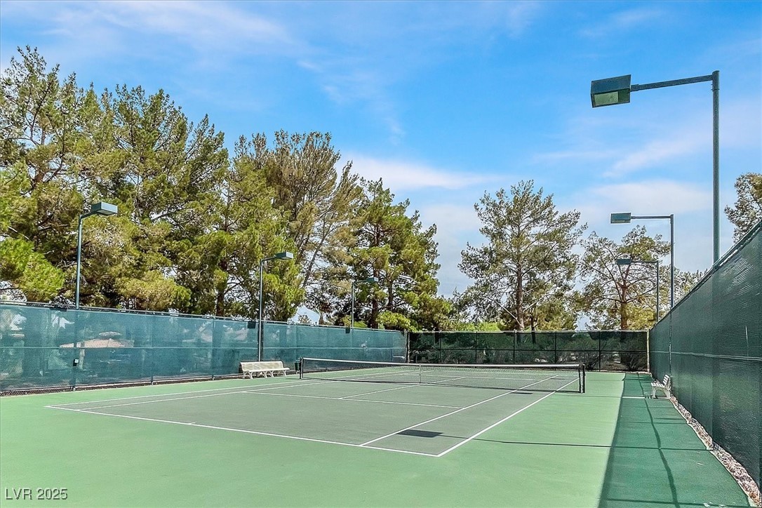 5421 Painted Mirage Road Las Vegas, NV 89149 - Photo 32 of 35 View of sport court featuring fence