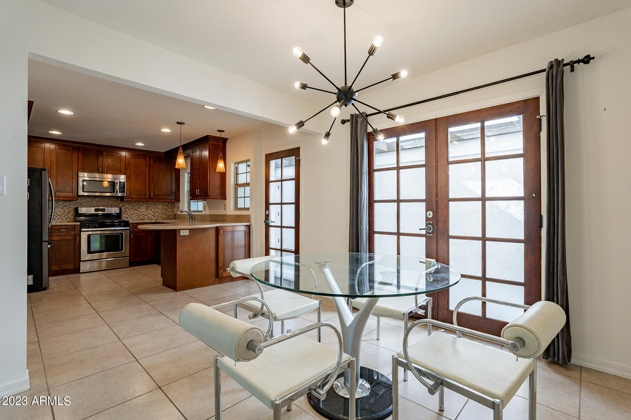 7720 East Camelback Road Scottsdale, AZ 85251 - Photo 8 of 22 Dining Room & Kitchen