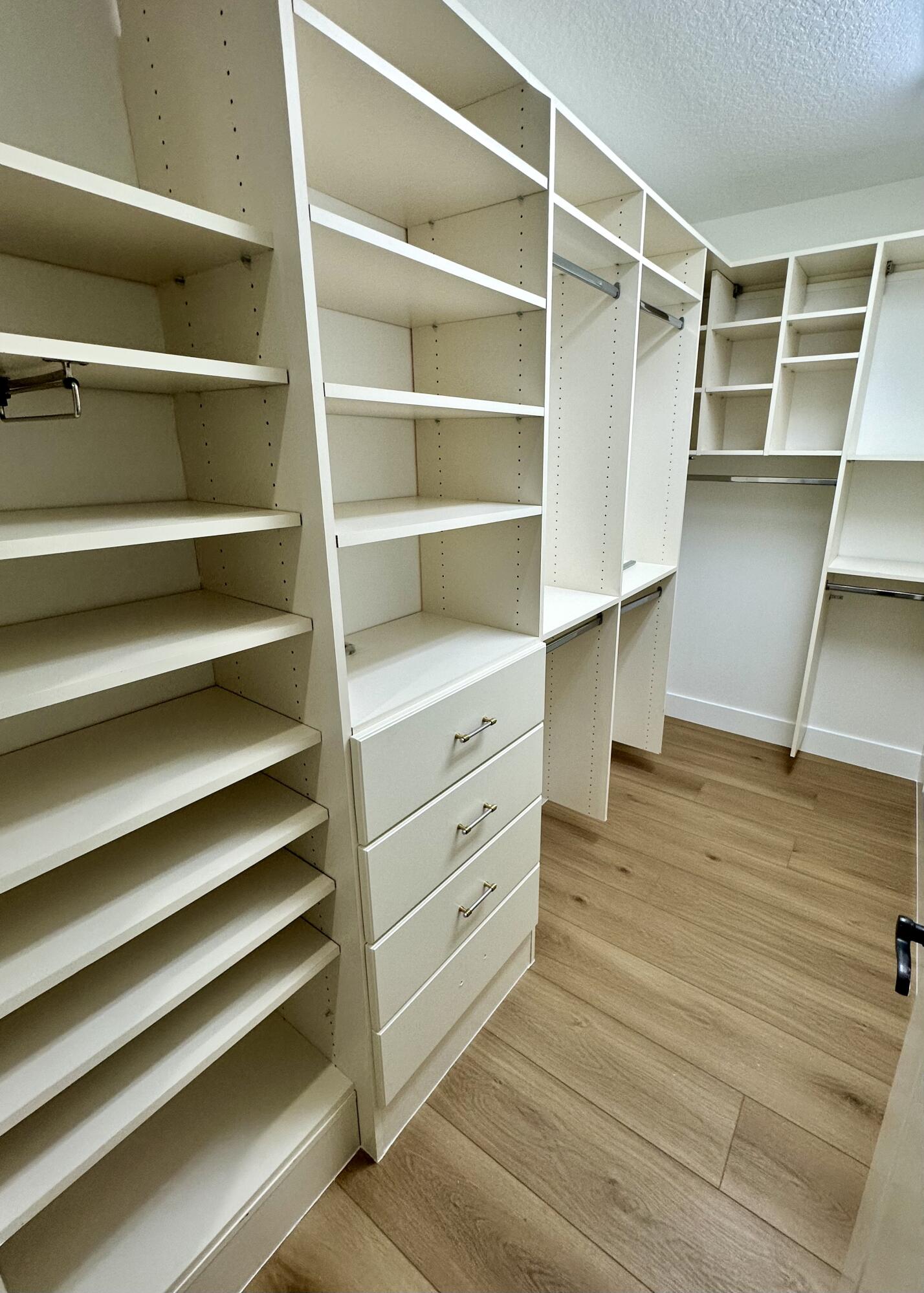 200 Northeast 2nd Avenue, Unit 312 Delray Beach, FL 33444 - Photo 16 of 30 a view of walk in closet with empty racks