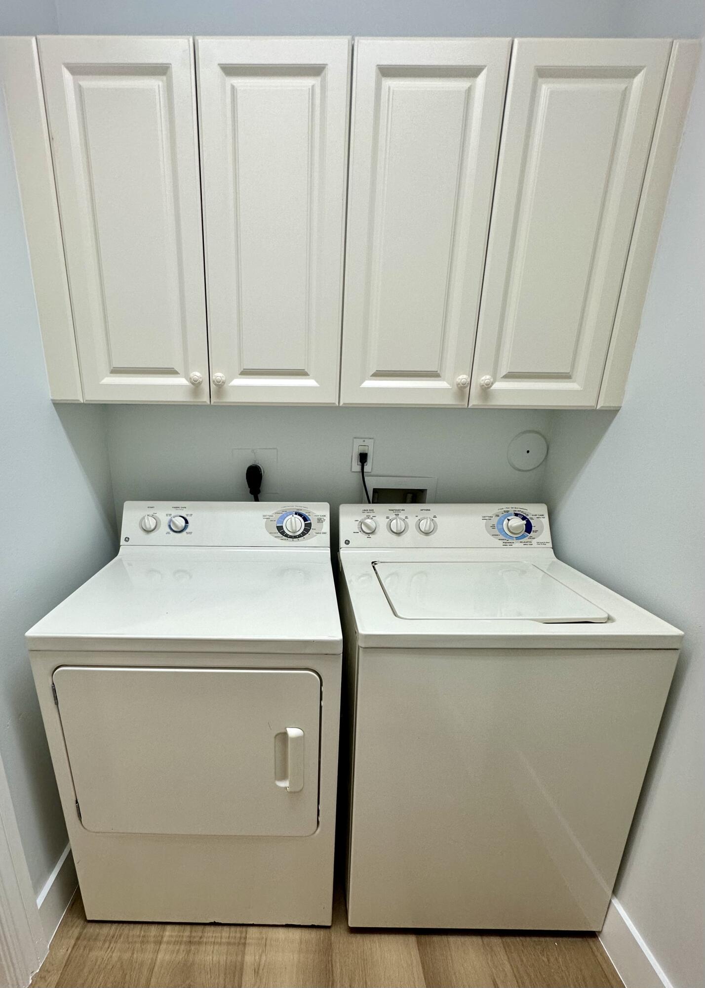 200 Northeast 2nd Avenue, Unit 312 Delray Beach, FL 33444 - Photo 22 of 30 a utility room with dryer and washer