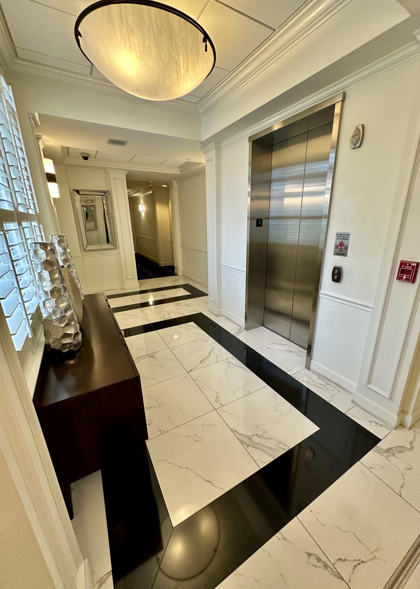 200 Northeast 2nd Avenue, Unit 312 Delray Beach, FL 33444 - Photo 3 of 30 a view of an entryway