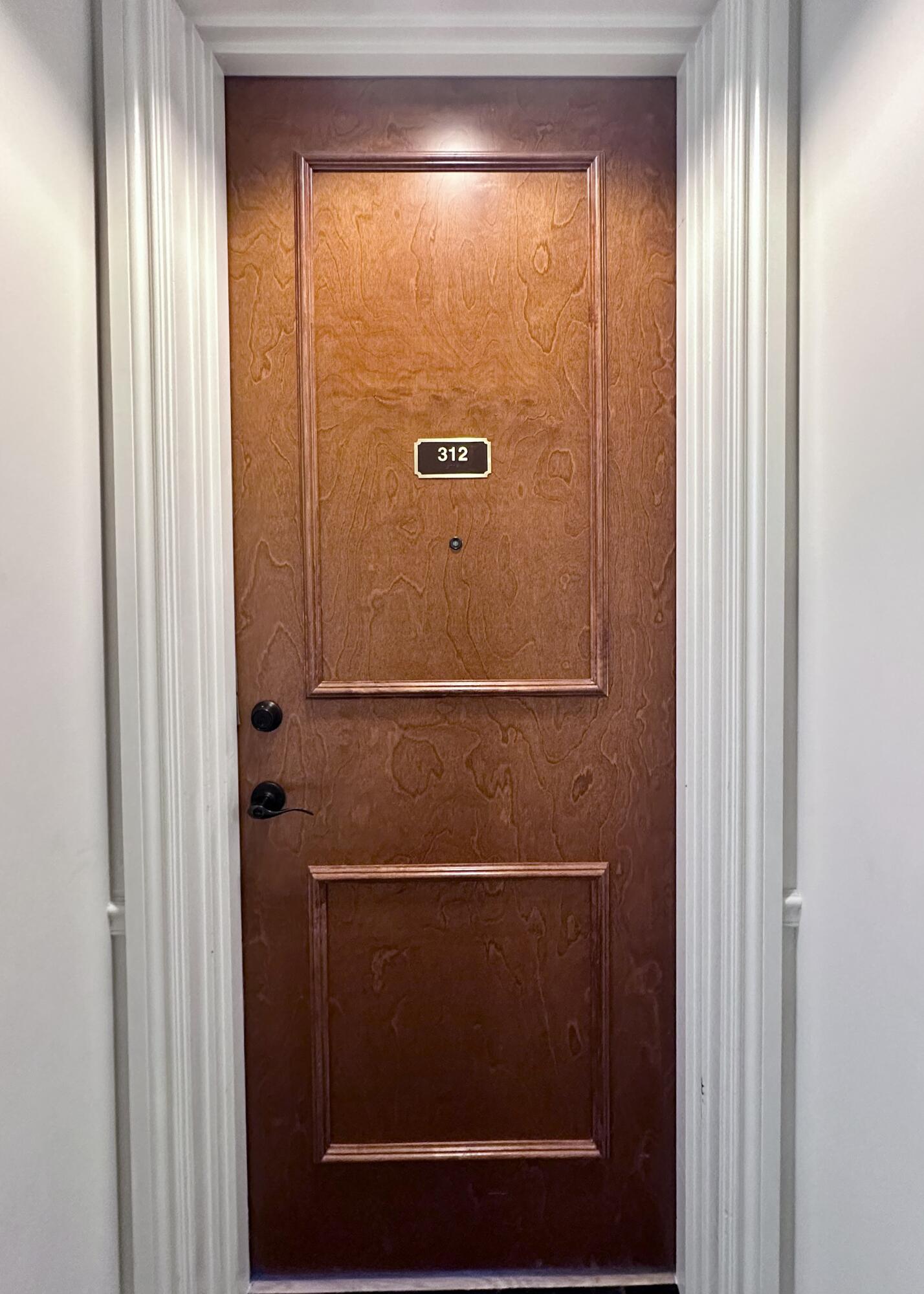 200 Northeast 2nd Avenue, Unit 312 Delray Beach, FL 33444 - Photo 6 of 30 a bathroom with a glass shower door