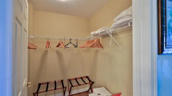 a view of a dining room with furniture and window