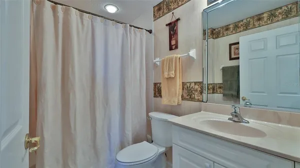 a kitchen with a stove and a sink