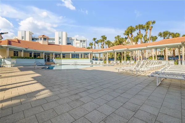 a view of swimming pool with lounge chair