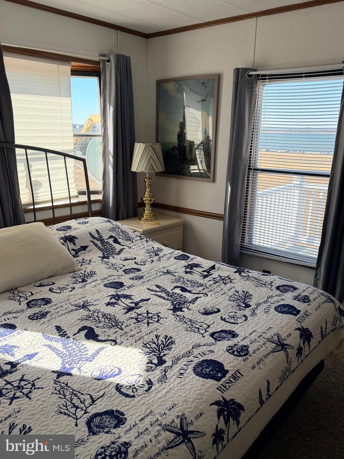 38267 Possum Road, Unit 271 Ocean View, DE 19970 - Photo 24 of 83 primary bedroom King bed/view of bay