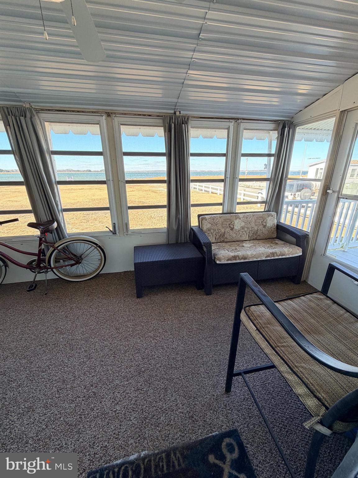 38267 Possum Road, Unit 271 Ocean View, DE 19970 - Photo 65 of 75 enclosed porch with wide open water views