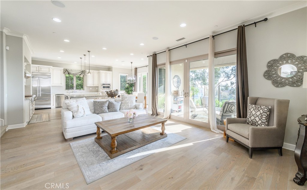 126 Long Fence Irvine, CA 92602 - Photo 15 of 61 a living room with furniture and a large window