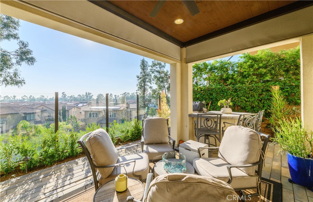 126 Long Fence Irvine, CA 92602 - Photo 20 of 61 a outdoor living space with furniture and garden view