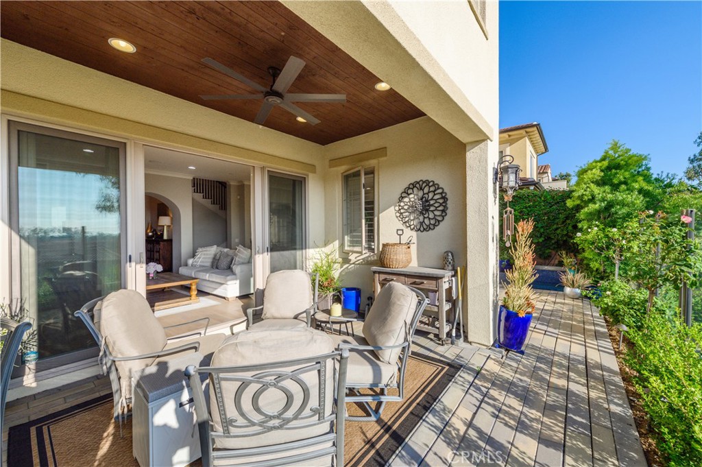 126 Long Fence Irvine, CA 92602 - Photo 23 of 61 a living room with furniture and a potted plant