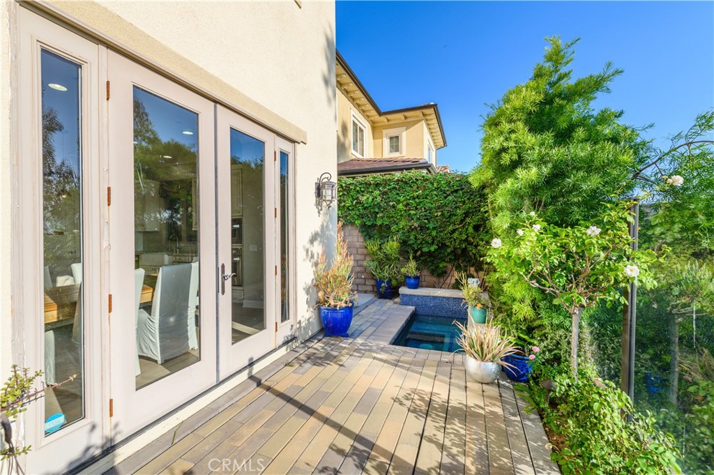 126 Long Fence Irvine, CA 92602 - Photo 24 of 61 a view of a house with backyard sitting area and garden