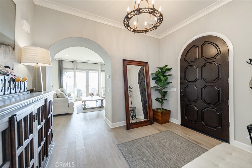 126 Long Fence Irvine, CA 92602 - Photo 3 of 61 a view of an entryway with a workspace and a window