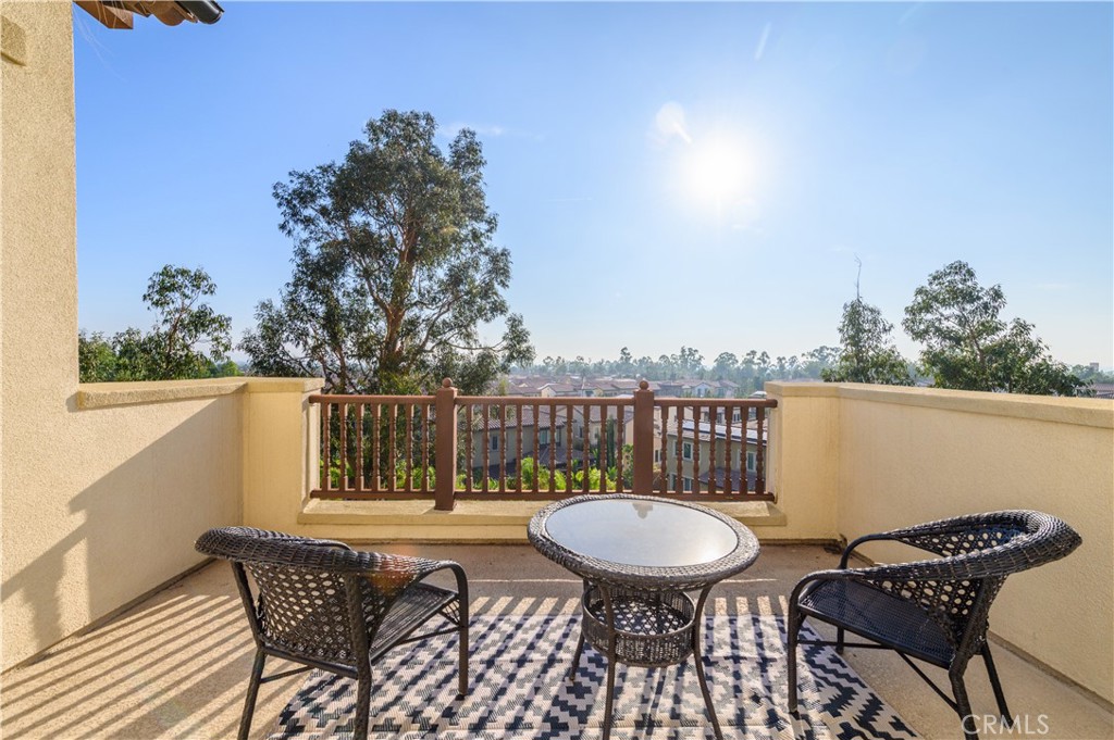 126 Long Fence Irvine, CA 92602 - Photo 57 of 61 a view of a chairs and table in back