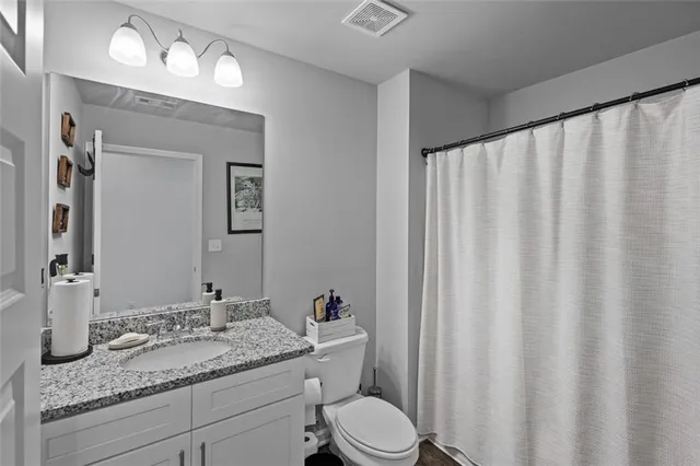 an empty room with closet area