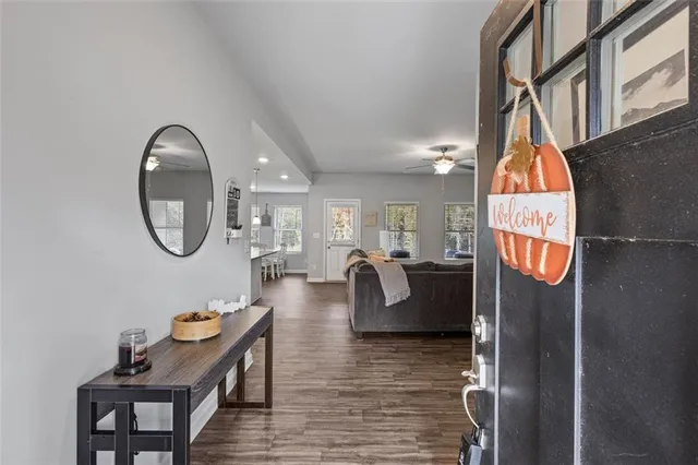 a dinning room with table and chairs