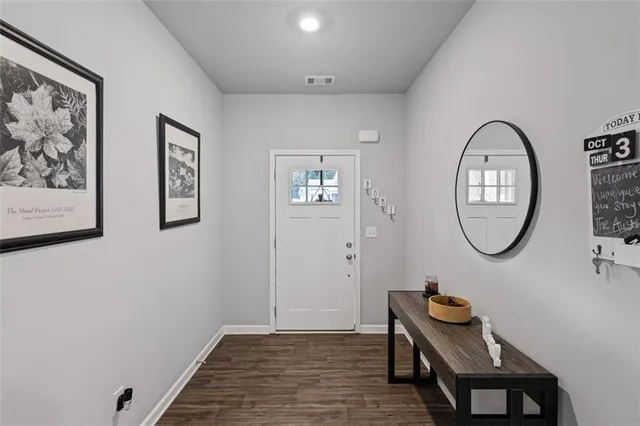 a bed room with bed and a ceiling fan