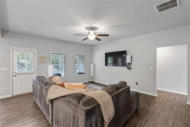 a bedroom with bed and a window