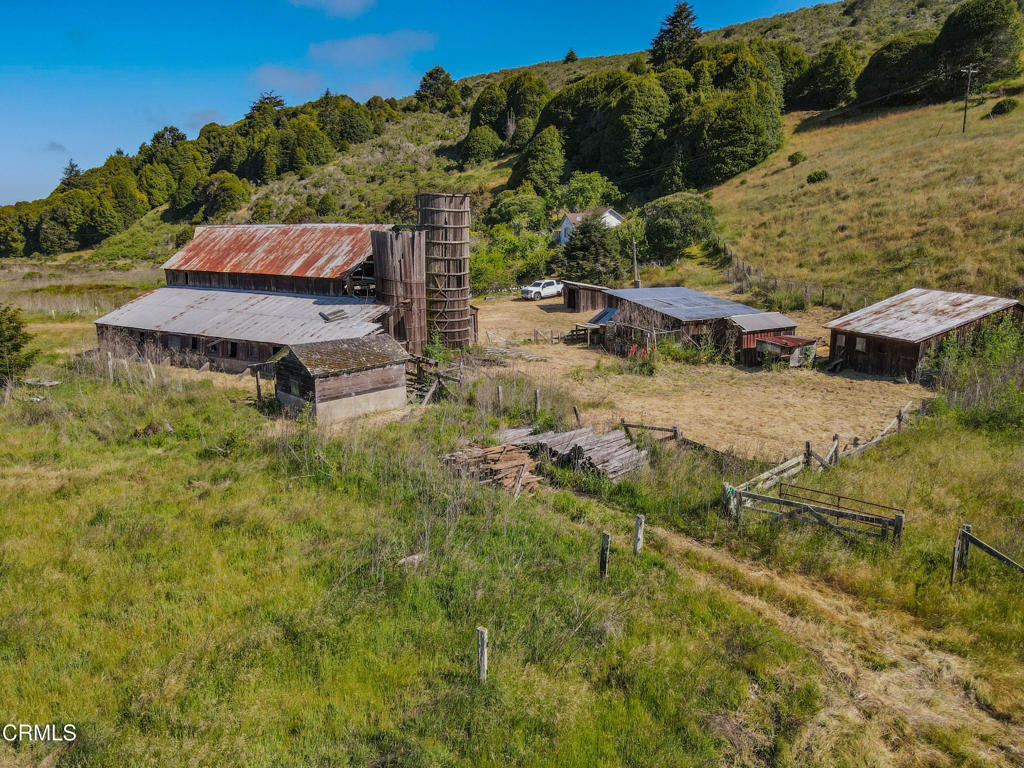 42000 Mountain View Road Manchester, CA 95459 - Photo 23 of 54 a backyard of a house with table and chairs