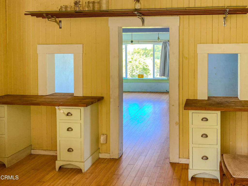 42000 Mountain View Road Manchester, CA 95459 - Photo 27 of 54 a view of walk in closet with wooden floor