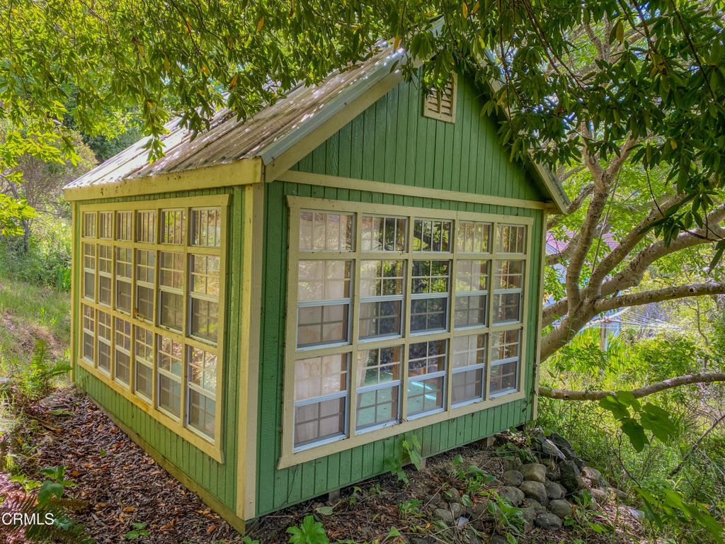 42000 Mountain View Road Manchester, CA 95459 - Photo 40 of 54 a front view of a house with a garden