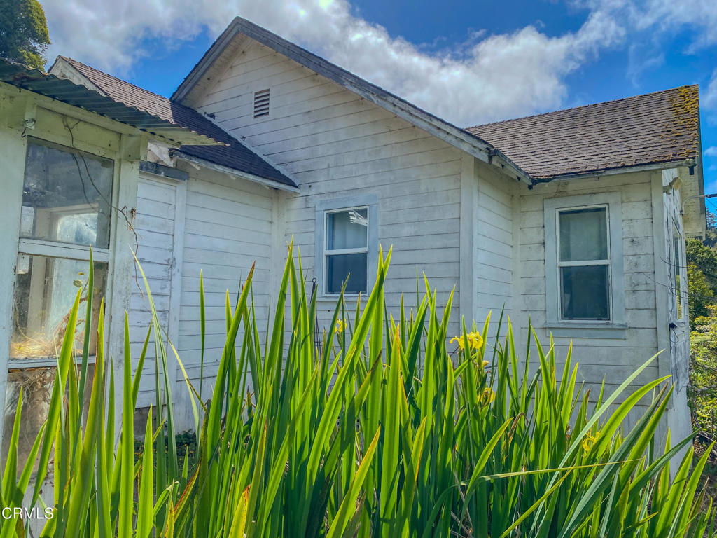 42000 Mountain View Road Manchester, CA 95459 - Photo 42 of 54 a view of a brick house with a small yard