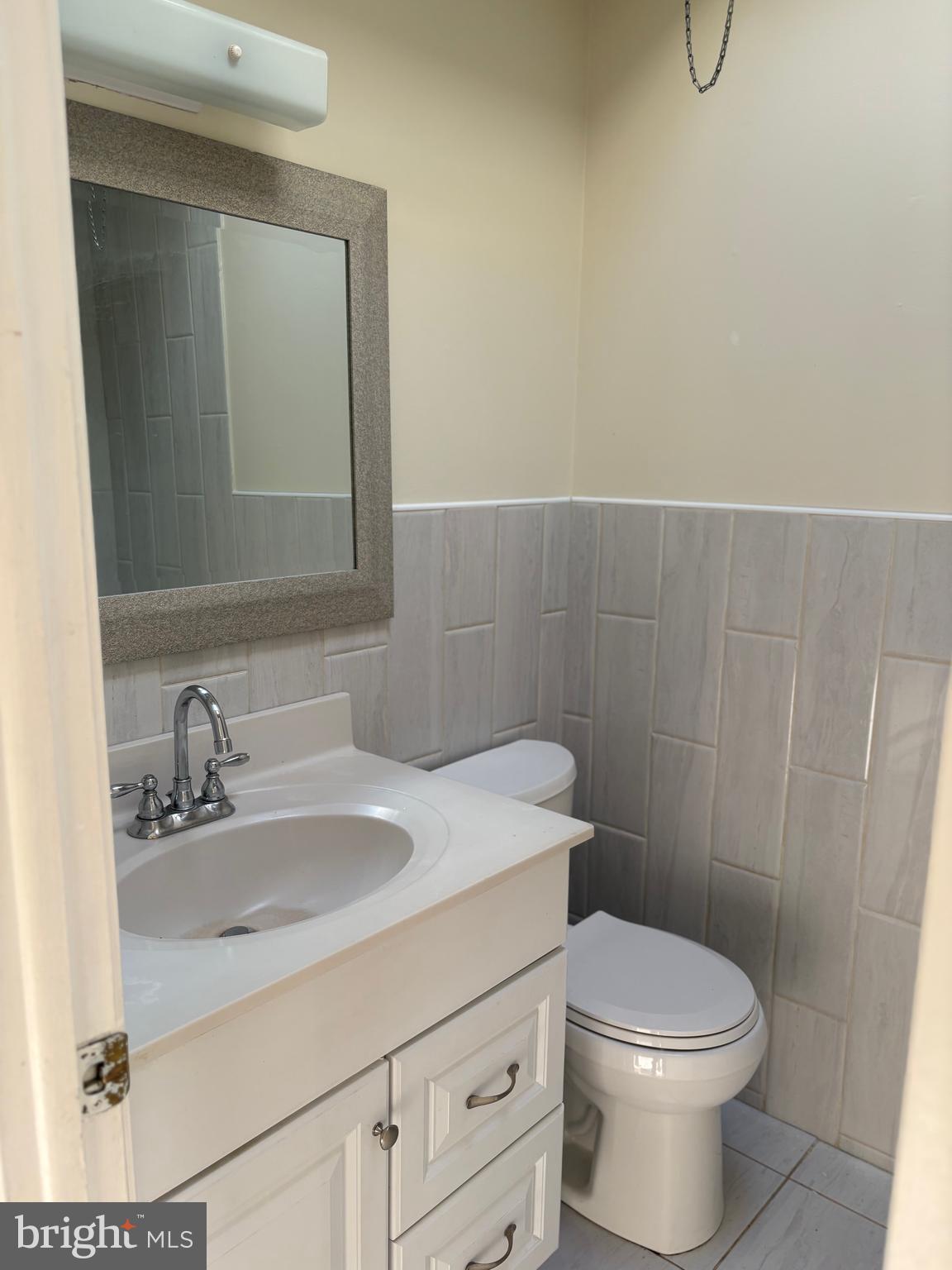 261 Ridgeway Terrace Philadelphia, PA 19116 - Photo 14 of 15 a bathroom with a sink toilet and vanity