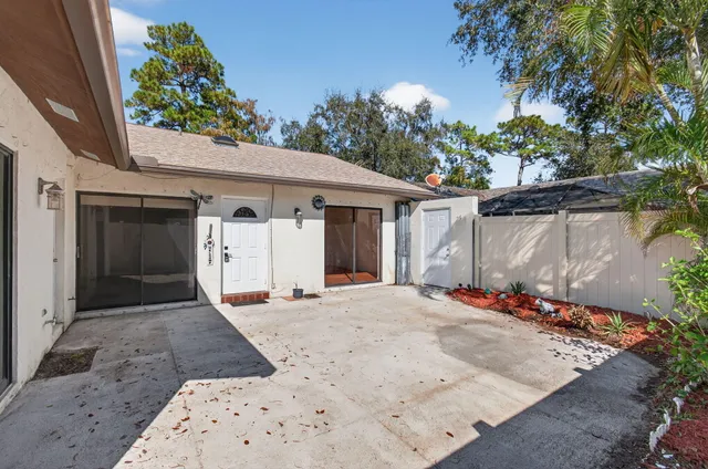a front view of a house with a garage