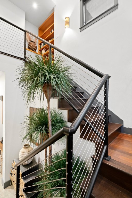 332 Rugged Earth Drive, Unit 1 Austin, TX 78737 - Photo 23 of 32 a view of balcony with wooden floor and a potted plant