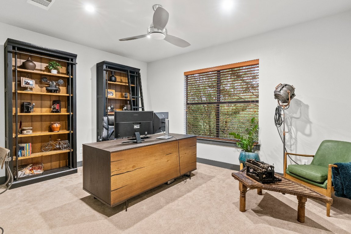 332 Rugged Earth Drive, Unit 1 Austin, TX 78737 - Photo 24 of 32 a living room with furniture