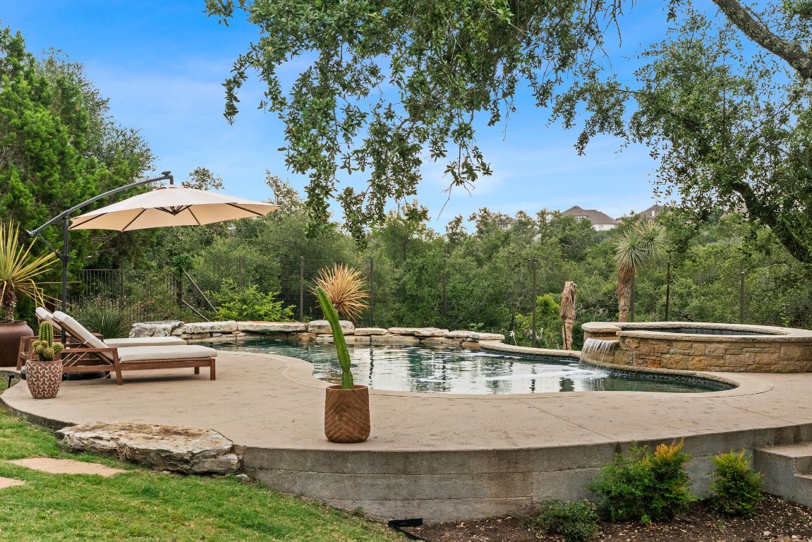 332 Rugged Earth Drive, Unit 1 Austin, TX 78737 - Photo 3 of 32 an outdoor space with furniture