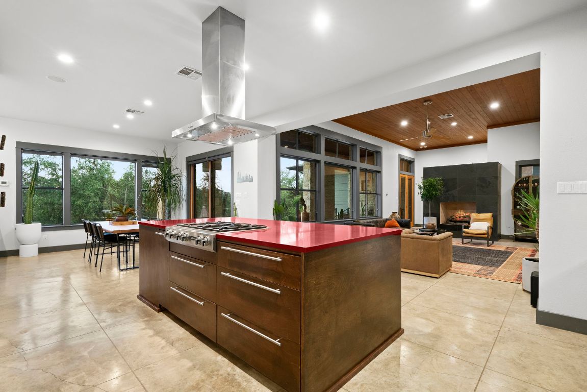 332 Rugged Earth Drive, Unit 1 Austin, TX 78737 - Photo 9 of 32 a view of living room with furniture and a large window