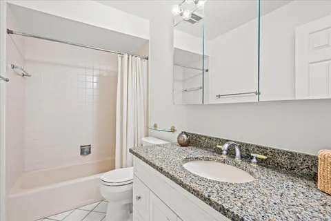 a view of a house with a tree